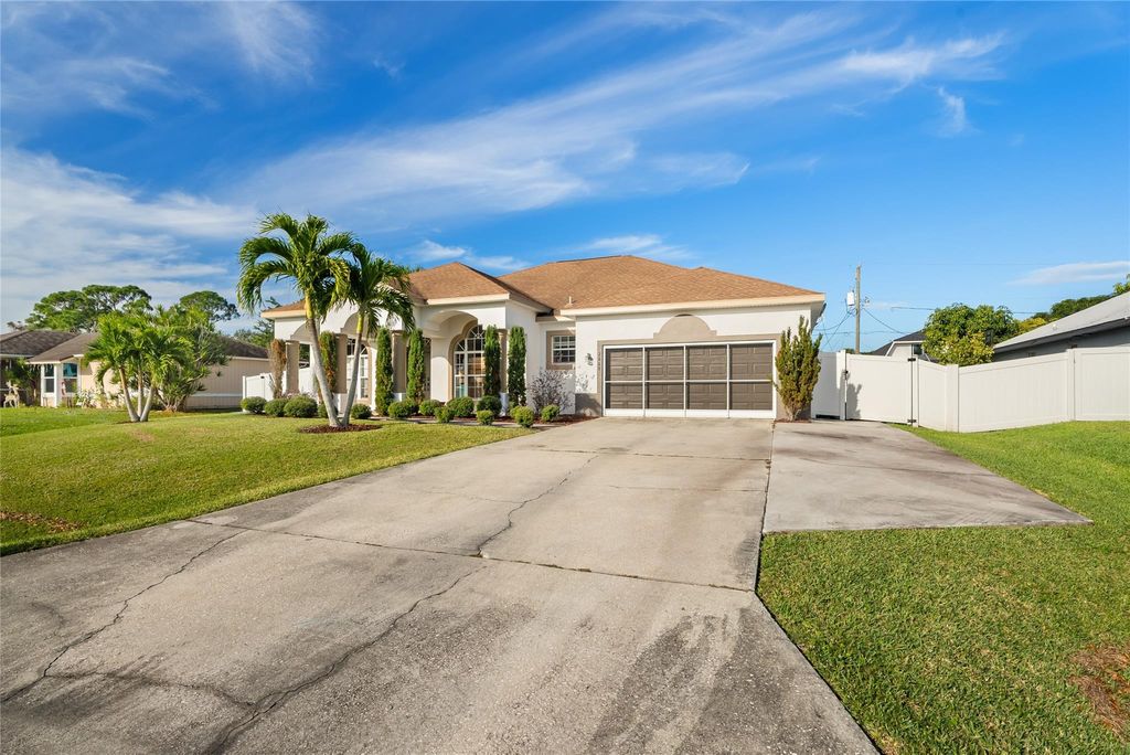 Photo of 2669 SW Acco Road, Port Saint Lucie, FL 34953 (MLS # F10495328)