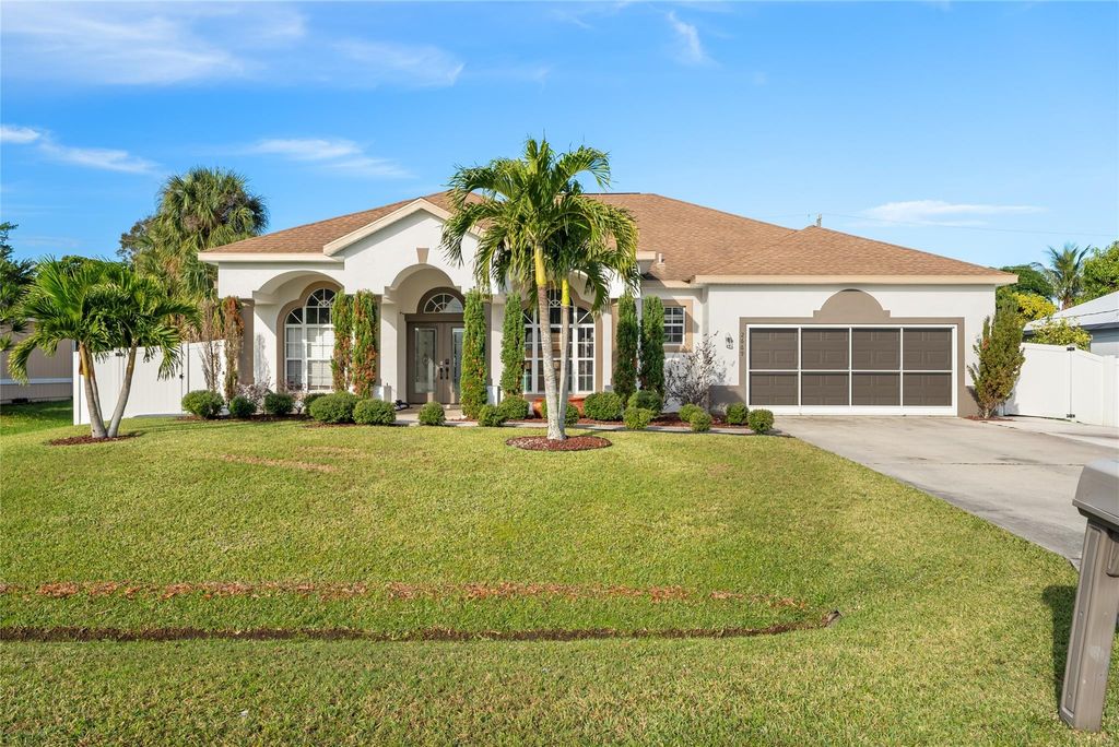 Photo of 2669 SW Acco Road, Port Saint Lucie, FL 34953 (MLS # F10495328)