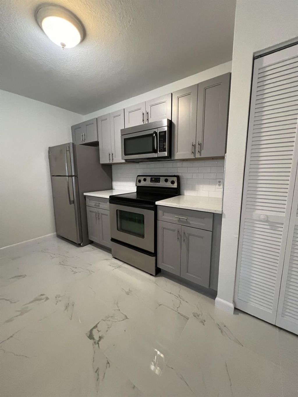 Photo of 1845 Palm Cove Boulevard #8-103, Delray Beach, FL 33445 (MLS # R11081570)