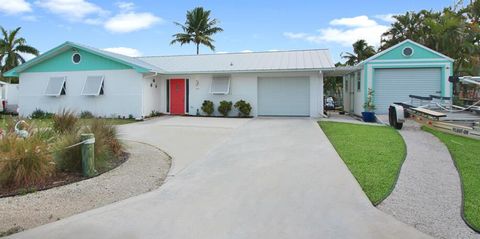 Photo of 66 SW Cabana Point Circle, Stuart, FL 34994 (MLS # R11077326)