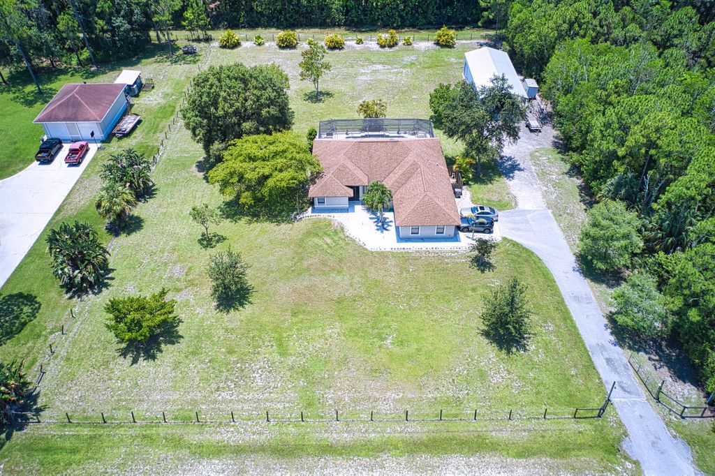 Photo of 12386 N 170th Road N, Jupiter, FL 33478 (MLS # R10943837)
