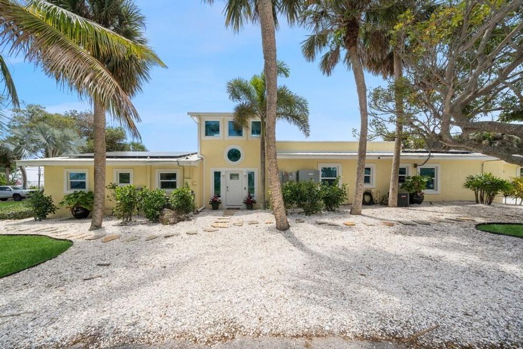 Photo of 11001 S Indian River Drive, Fort Pierce, FL 34982 (MLS # R10974563)