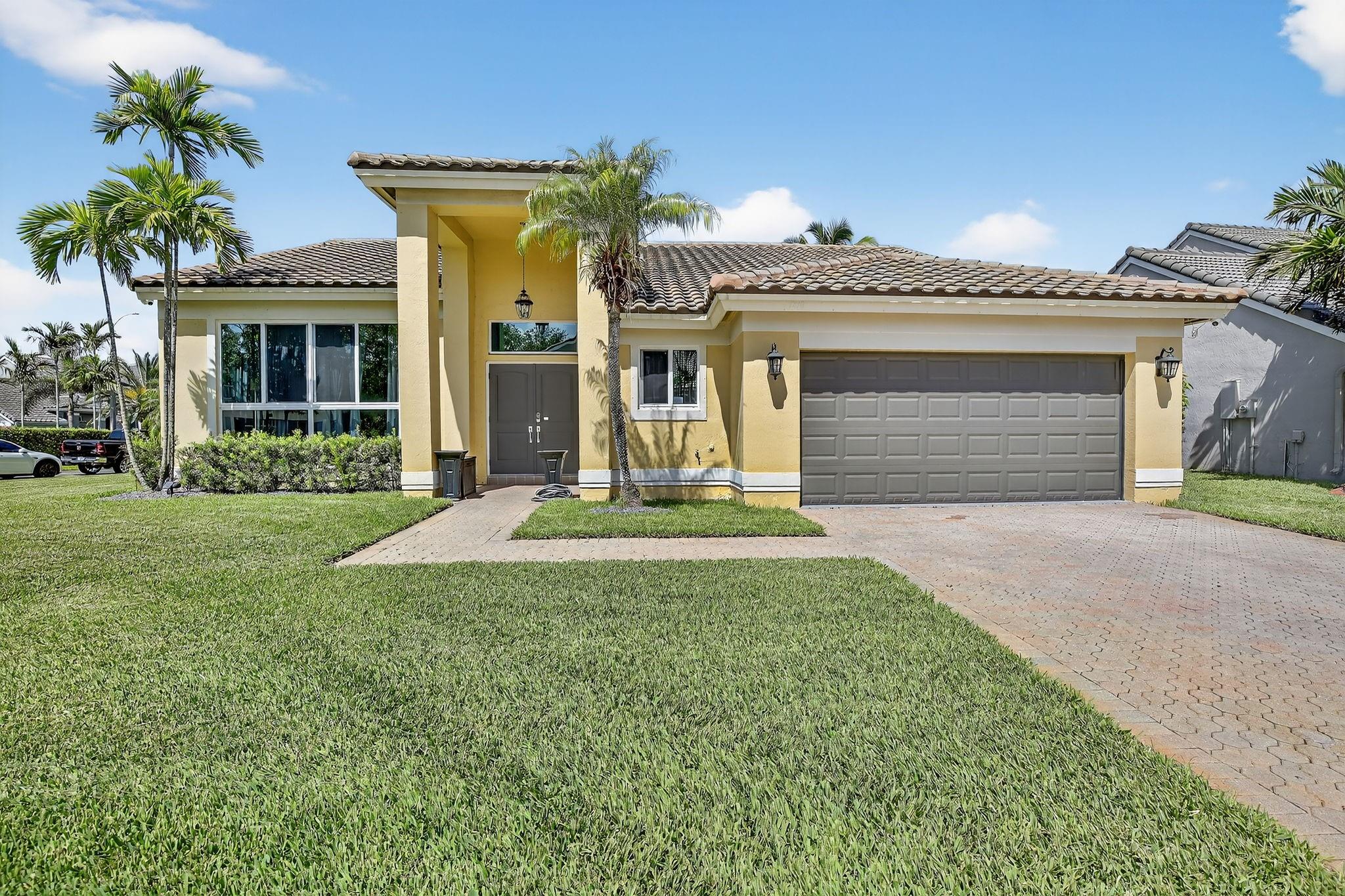 Beautifully Updated Home in Chapel Trail Estates
Step into this impeccably maintained residence located on a prime corner lot in the sought-after Chapel Trail Estates. Featuring a spacious open floor plan with soaring vaulted ceilings and stylish porcelain tile throughout, this home offers both comfort and elegance. Enjoy peace of mind with major upgrades including a brand-new roof (2022), impact-resistant hurricane windows (2022), and a full plumbing replacement (2023). This is a rare opportunity to own a truly move-in-ready home in one of Pembroke Pines’ most desirable communities.