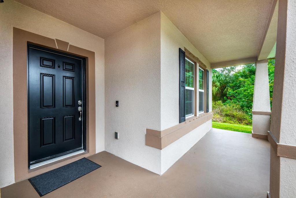 Photo of 483 SW Tarra Avenue, Port Saint Lucie, FL 34953 (MLS # R10951574)