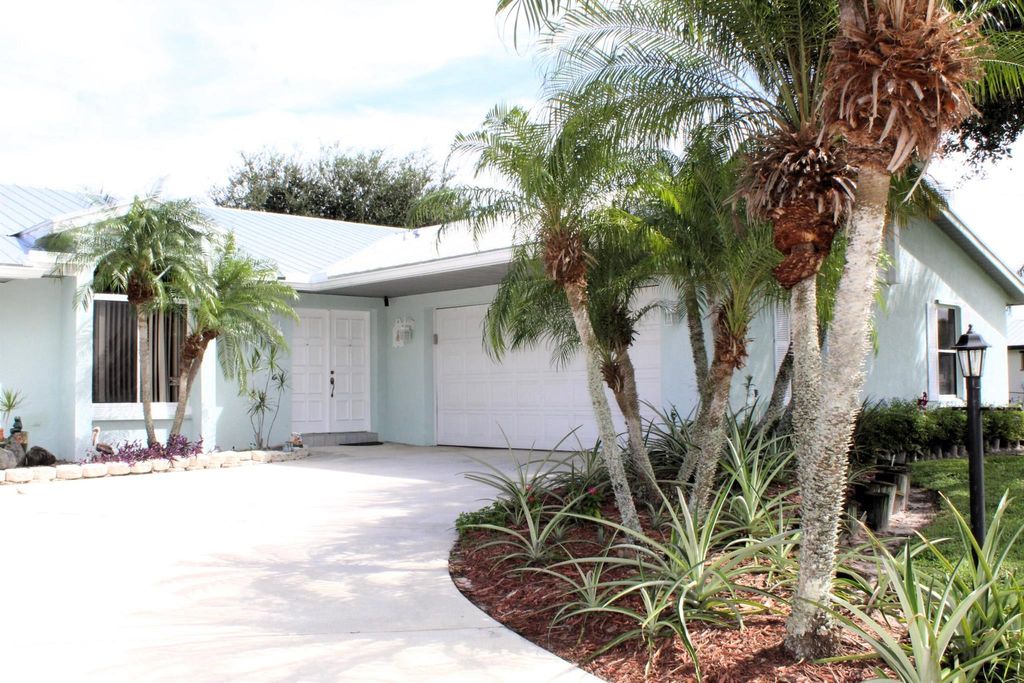 Photo of 2241 SE Leithgow Street, Port Saint Lucie, FL 34952 (MLS # R10925681)