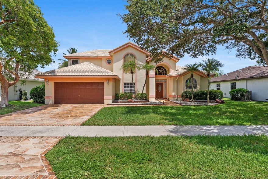 Rarely Available 4BR/3BA Pool Home in Desirable Winston Park! Spacious 2-story home with over 2,200 sq ft of living space, situated on an 8,300+ sq ft lot. Unique layout features 2 bedrooms upstairs and 2 bedrooms on the main floor, including a first-floor primary suite. Located on a quiet street with full privacy on canal. Enjoy a completely renovated pool and spa with a large screened-in patio, 42' lanai, and 2 covered areas--perfect for outdoor living and entertaining. The lush backyard features an array of fruit trees, creating your own tropical retreat. Renovated kitchen and baths with modern finishes. 2022 A/C, 2009 roof, new water heater, and full wind protection with accordion shutters on the second floor. 2-car garage, stamped concrete, very low HOA. Zoned for A-rated schools.
