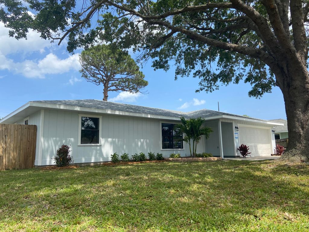 Photo of 2231 SE Trillo Street, Port Saint Lucie, FL 34952 (MLS # R10788229)