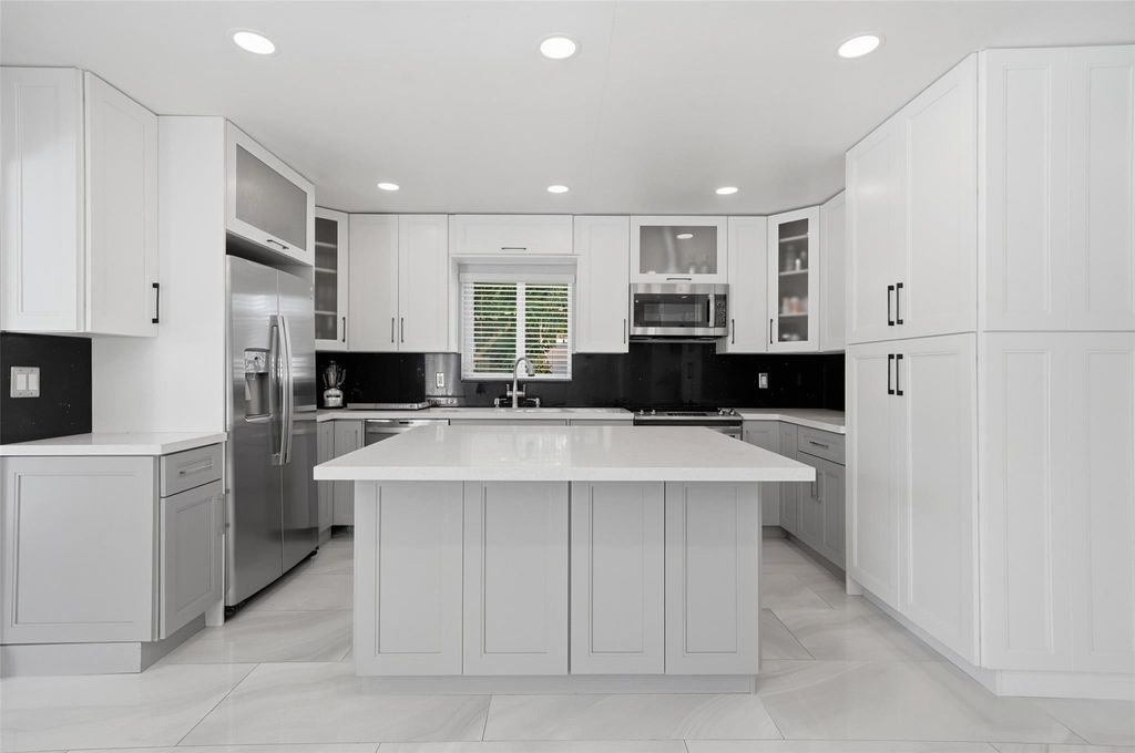 Photo of 1580 NE 34th Street, Oakland Park, FL 33334 (MLS # F10549099)