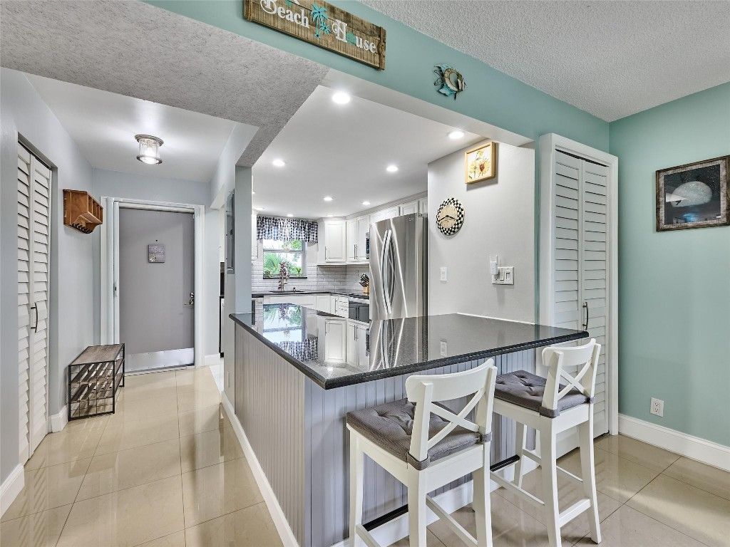 Photo of 6020 NW 44th Street #401, Lauderhill, FL 33319 (MLS # F10544663)