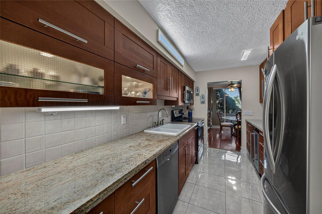 Photo of 4702 Fountains Drive S, Greenacres, FL 33467 (MLS # B26027394)