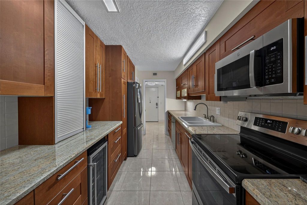 Photo of 4702 Fountains Drive S, Greenacres, FL 33467 (MLS # B26027394)