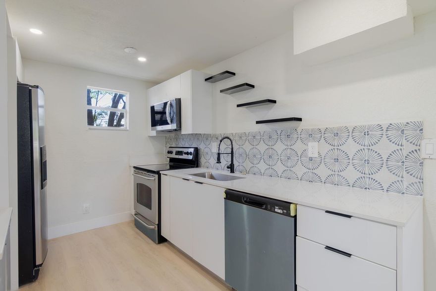 Welcome to 1108 W 33rd Street in Riviera Beach - a beautifully renovated 3-bedroom, 2-bath home that's truly move-in ready. This turnkey property features hurricane impact windows, modern finishes, and an open layout designed for comfort and convenience.With no HOA restrictions, you'll enjoy the freedom to personalize your home and lifestyle. Ideally located just minutes from the beach, downtown West Palm Beach, and the Palm Beach Cruise Port, you'll have the best of South Florida living right at your doorstep.Whether you're searching for a primary residence, a vacation retreat, or a smart investment property, this home checks all the boxes. Don't miss your chance to own a fully updated home in a prime location!