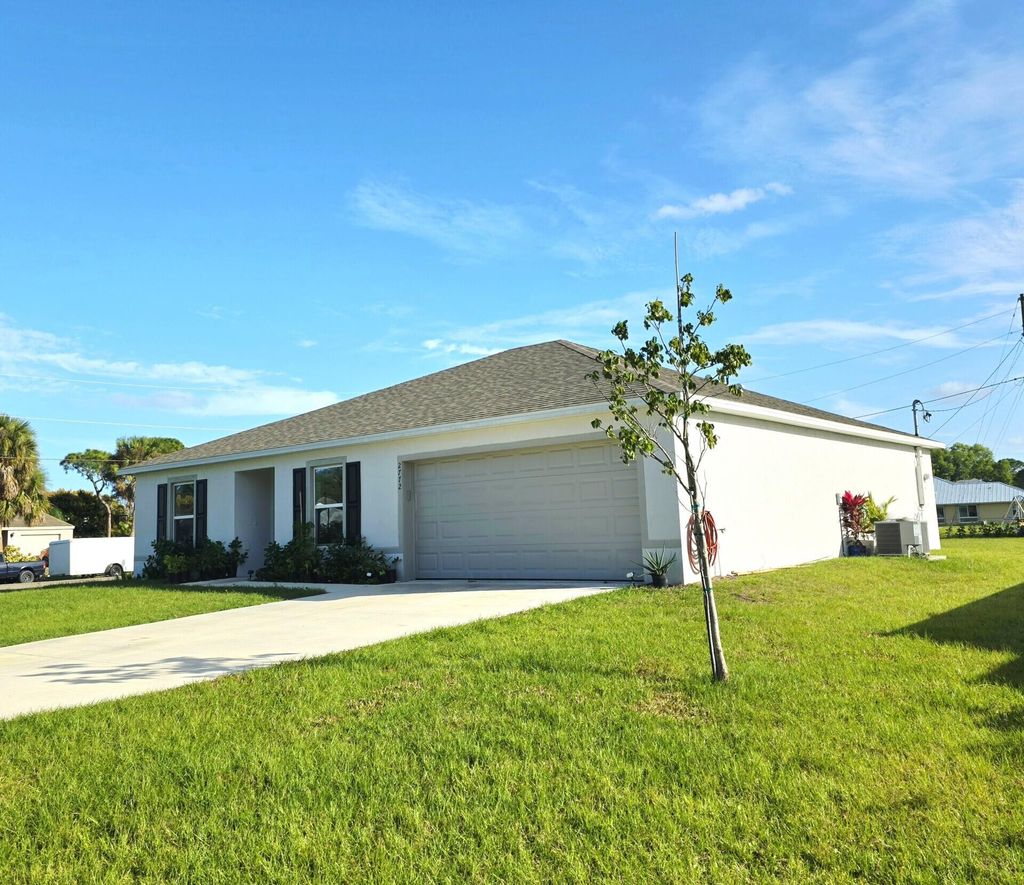 Photo of 2772 SE Garfield Avenue, Port Saint Lucie, FL 34952 (MLS # R11149567)