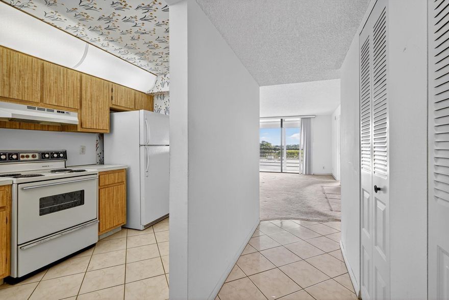 Opportunity knocks in this fifth-floor unit at Lucerne Lakes--a spacious 2-bedroom, 2-bath condo in a vibrant 55+ community. With great bones, loads of natural light, and a view overlooking the sparkling community pool, this condo is brimming with potential. The screened balcony is the perfect spot to unwind, while the interior is ready for your personal touch and creative updates. Located in a quiet, elevator building just minutes from shopping, dining, and everyday essentials--this is your chance to design the Florida lifestyle you've been dreaming of.