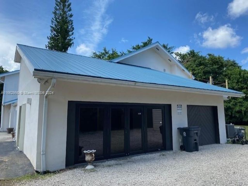 Photo of 4450 S Jog Road, Greenacres, FL 33467 (MLS # R11130484)