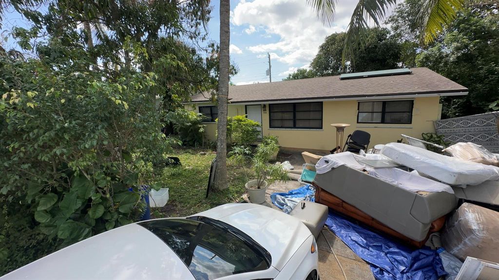 Photo of 3558 Betty Ann Court E, Lake Park, FL 33403 (MLS # R10967906)