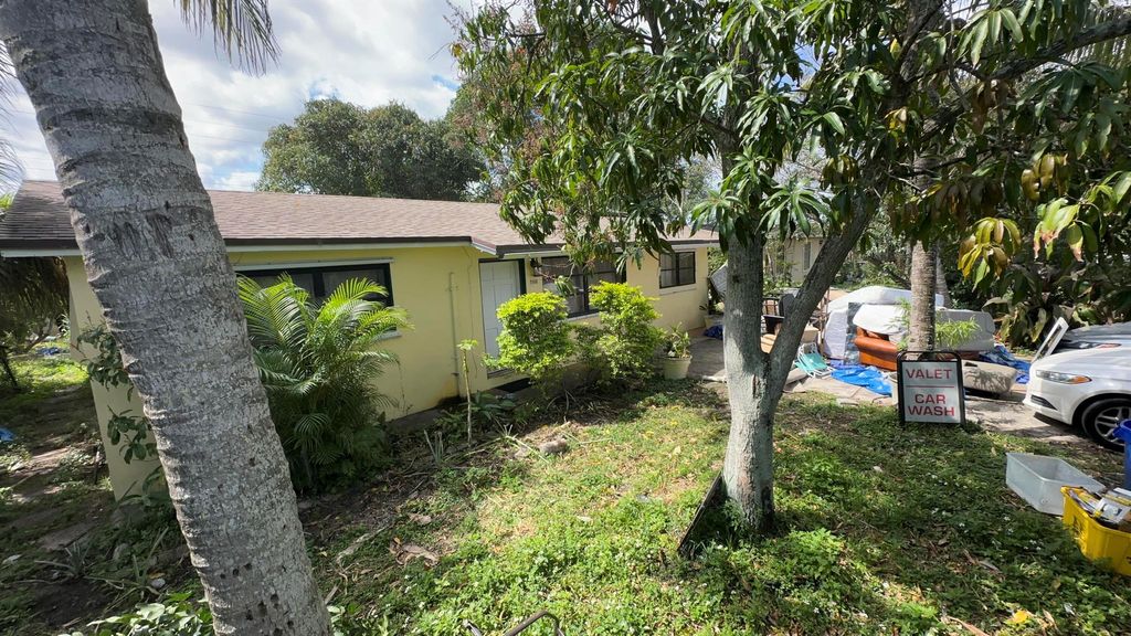 Photo of 3558 Betty Ann Court E, Lake Park, FL 33403 (MLS # R10967906)