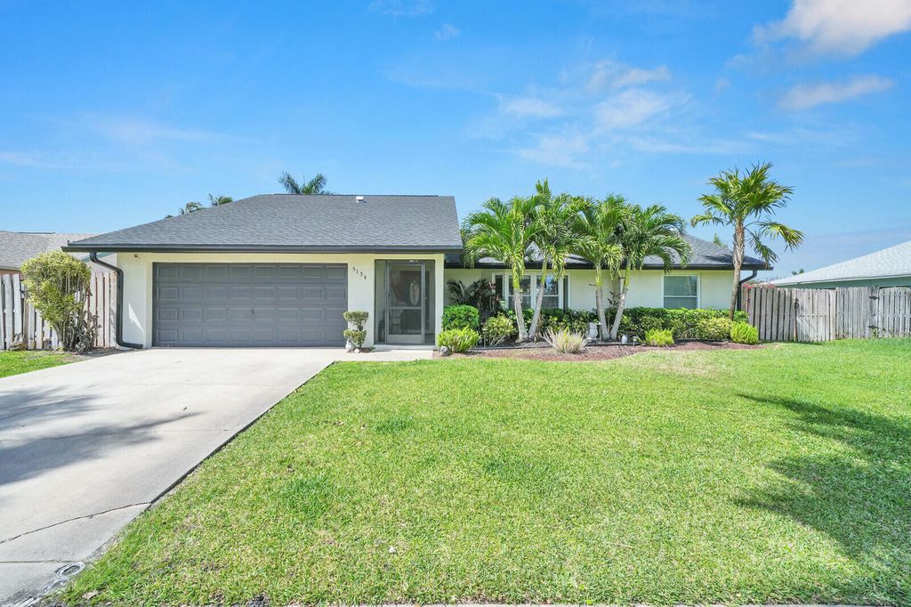 Photo of 5154 Woodstone Circle E, Greenacres, FL 33463 (MLS # B26001444)