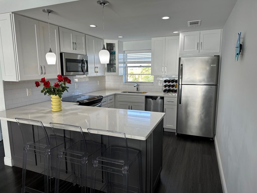 Photo of 52 Yacht Club Drive #402, North Palm Beach, FL 33408 (MLS # R11076506)