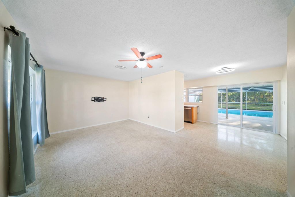 Photo of 620 SE Clifton Lane, Port Saint Lucie, FL 34983 (MLS # R11082970)
