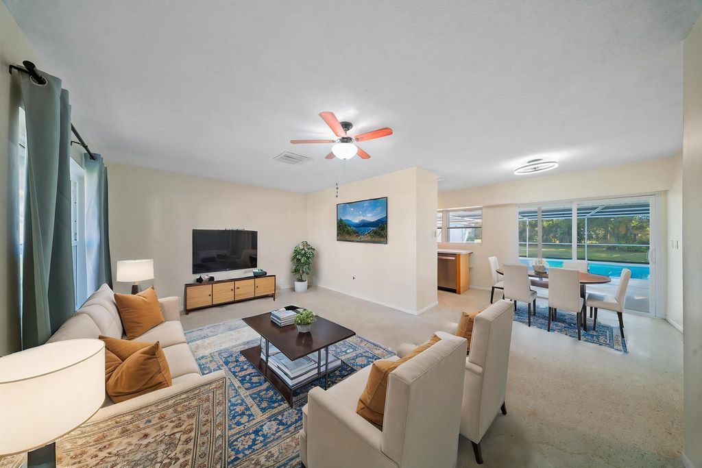 Photo of 620 SE Clifton Lane, Port Saint Lucie, FL 34983 (MLS # R11082970)