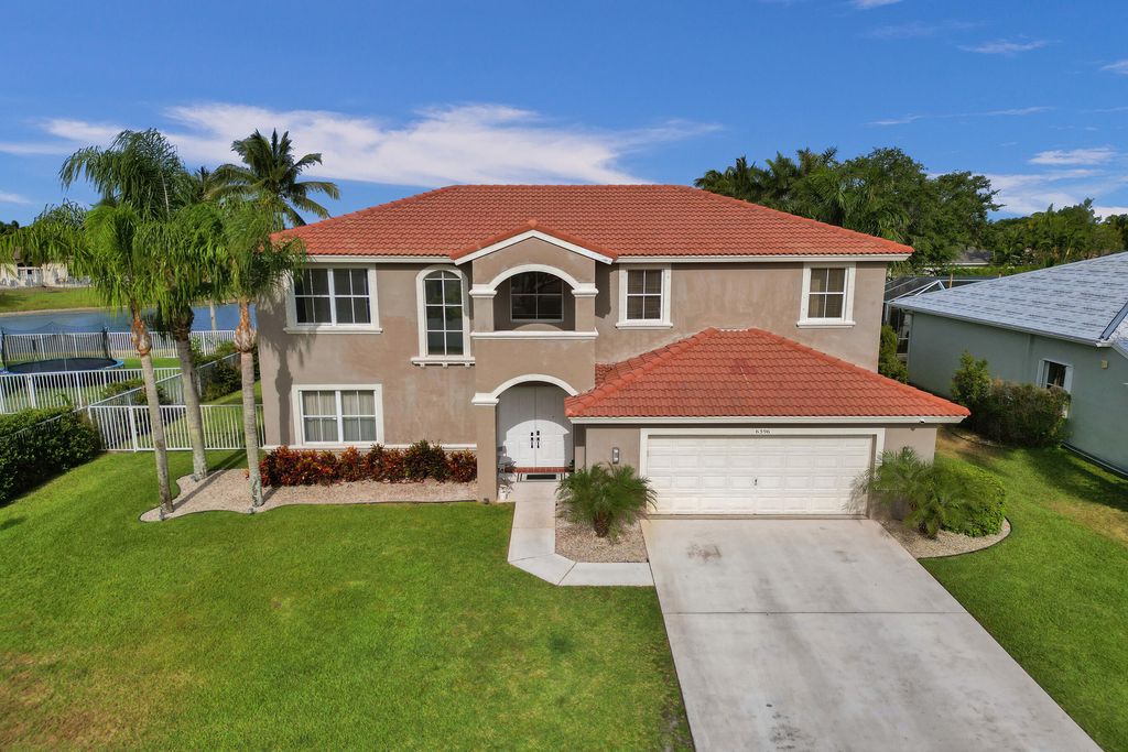 Photo of 6396 Shadow Creek Village Circle, Lake Worth, FL 33463 (MLS # R11088200)