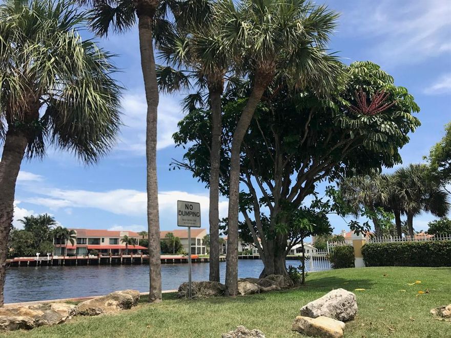 FULLY RENOVATED 2/2.5 TOWN-HOME IN THE DESIRABLE EAST BOCA RATON GATED ICW COMMUNITY OF BOCA QUAY. FRESHLY PAINTED -EXCEPTIONAL FEATURES & FINISHES INCLUDING 2 MASTER SUITES EACH WITH IT'S OWN BATHROOM PLUS AN OVER-SIZED LIVING AREA THAT EXTENDS TO THE PRIVATE FENCED IN LANAI PERFECT FOR ENTERTAIN! A  KITCHEN SPACE WITH STAINLESS STEEL APPLIANCES/GRANITE COUNTER-TOPS & MOSAIC TILE TRIM. WOOD & LAMINATE FLOORING THROUGHOUT ENTIRE UNIT & A BRAND NEW FULL SIZE WASHER & DRYER! WATER INCLUDED! JUST A SHORT STROLL TO THE COMMUNITY POOL & ICW TO WATCH YOUR VERY OWN DAILY BOAT PARADE! ASSIGNED PARKING SPACE. GREAT LOCATION. EAST OF US-1. CLOSE TO I-95, SHOPPING, RESTAURANTS & BEACHES IN BOCA RATON & DELRAY BEACH! WELCOME HOME!