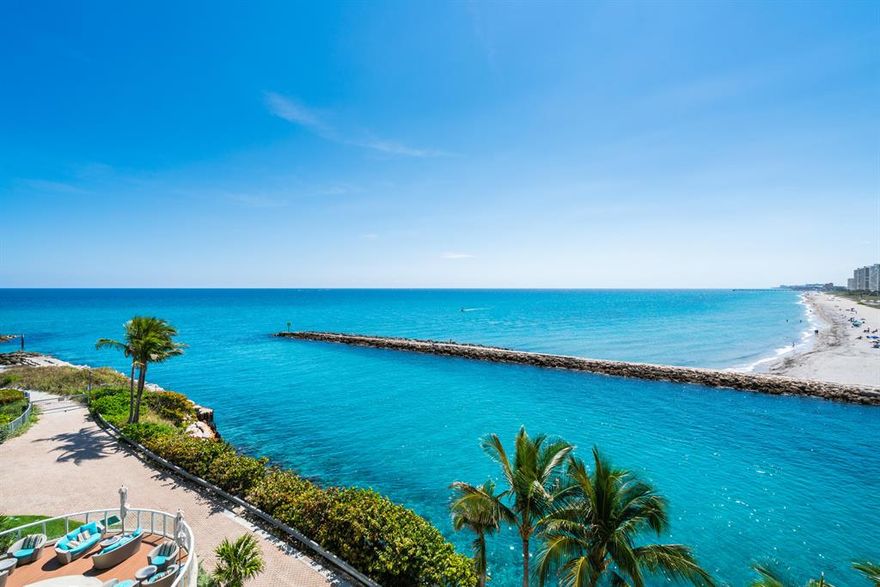 This spectacular fully furnished and highly coveted residence has panoramic south vistas overlooking the Boca Raton inlet and oceanfront shoreline all the way to the Deerfield Beach pier. Featured is over $2 million in custom finishes including Brazilian cherry wood floors and floor to ceiling glass windows that provide stunning ocean and intracoastal views from every room from sunrise to sunset. An elevator opens into your private entry foyer, and a richly appointed kitchen services a dining area and entertainment great room with exquisite furniture quality built-ins.  An exceptionally spacious Master suite has magnificent inlet and ocean views, as do the two guest suites. An expansive and covered terrace, wine room, and dual parking spaces make this special offering a ''turnkey'' move-in opportunity that simply won't last. The third bedroom is currently being used as an office / study with built-in desk and cabinetry.  Additionally the existing bathroom urinal can be removed and a shower installed. Built-in wall closets can be added.