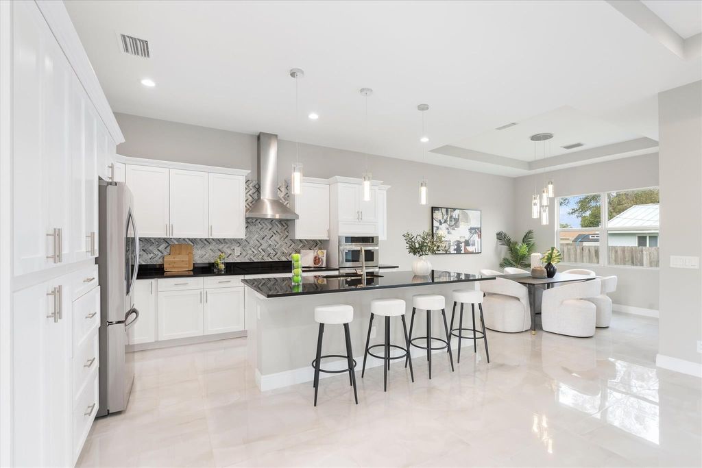 Photo of 9033 Twig Road, Lake Worth, FL 33467 (MLS # R10945437)