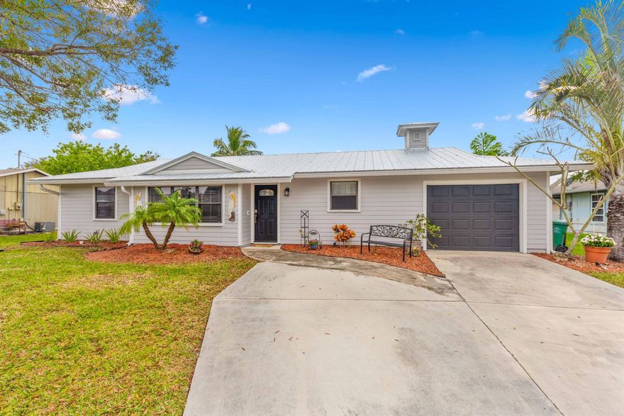 Welcome to this exceptional single-family home in a sought-after PSL non-HOA neighborhood. With 4 bedrooms, 2 bathrooms, 2021 metal roof, 2020 A/C, updated kitchen, SS appliances, walk-in pantry, updated laundry/ utility area and a large backyard...this home is perfect for families seeking ample space and contemporary comforts.
The main BR is complete with an en-suite BA for added privacy and three additional BR's and BA provide flexibility for family, guests, a home office or hobby room ensuring comfort and functionality. Designed for outdoor living, home features a large backyard, perfect for hosting gatherings, or simply enjoying the serene ambiance. This property guarantees a comfortable and enjoyable lifestyle for you and your loved ones. Call today!