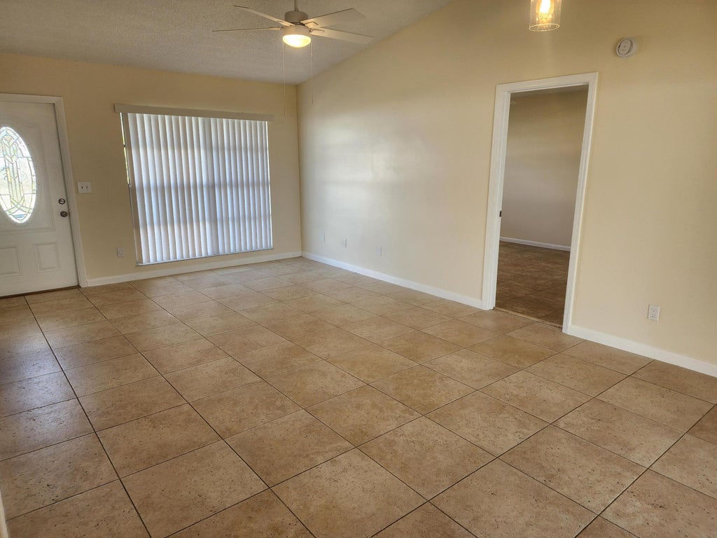 Photo of 941 SW Mccall Road, Port Saint Lucie, FL 34953 (MLS # R11149429)