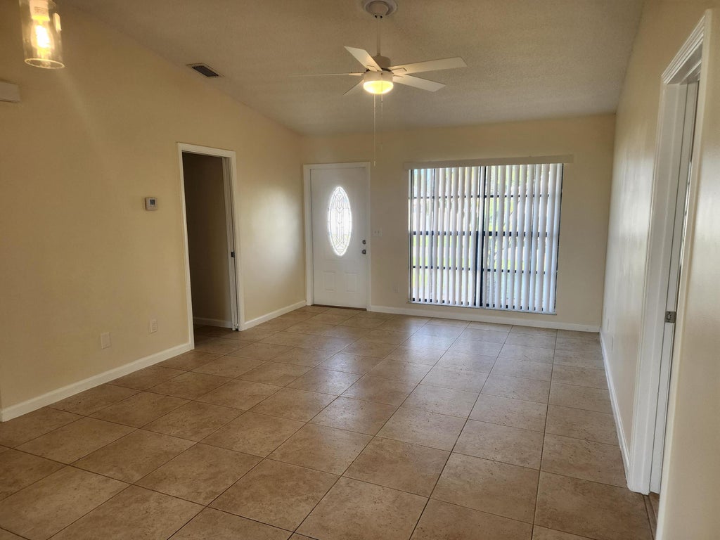 Photo of 941 SW Mccall Road, Port Saint Lucie, FL 34953 (MLS # R11149429)