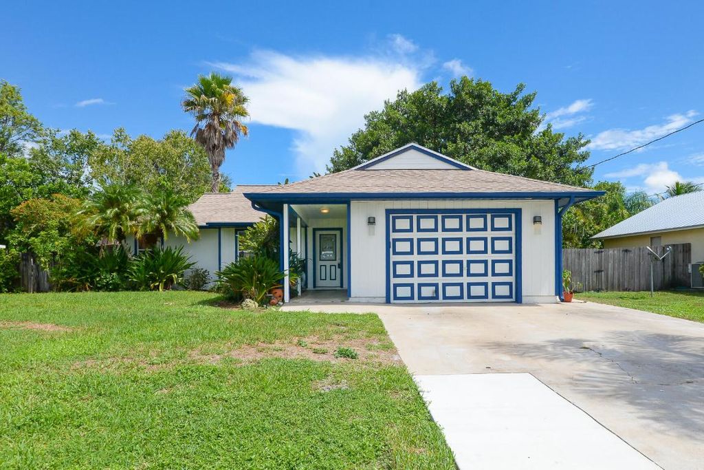 Photo of 1413 SW Hutchins Street, Port Saint Lucie, FL 34983 (MLS # R11127089)