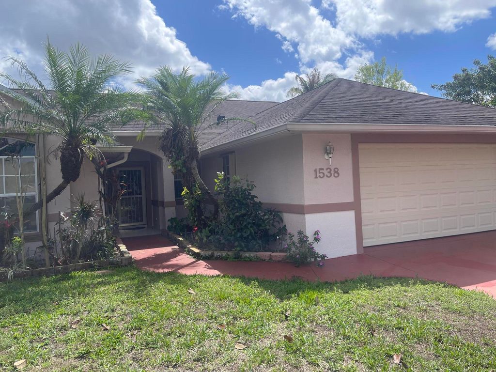 Photo of 1538 SW Neptune Avenue, Port Saint Lucie, FL 34953 (MLS # B26004962)