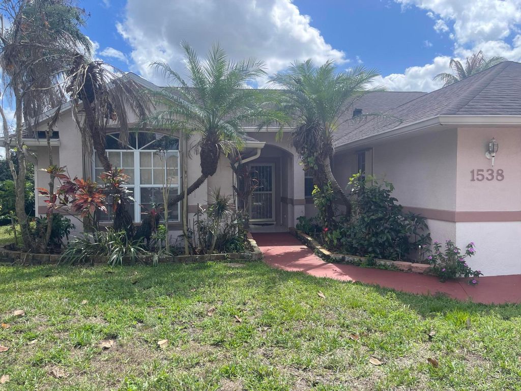 Photo of 1538 SW Neptune Avenue, Port Saint Lucie, FL 34953 (MLS # B26004962)
