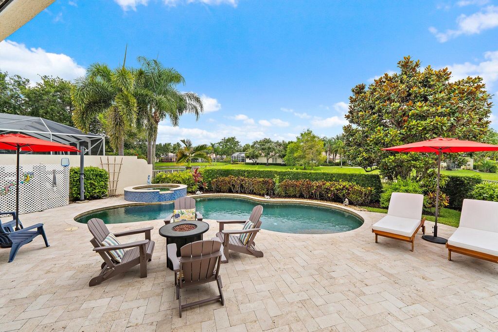 Photo of 102 Euphrates Circle, Palm Beach Gardens, FL 33410 (MLS # B26035644)