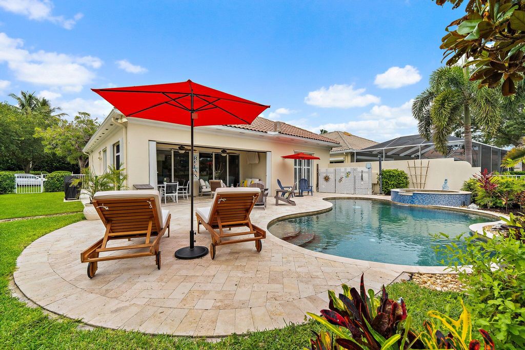 Photo of 102 Euphrates Circle, Palm Beach Gardens, FL 33410 (MLS # B26035644)