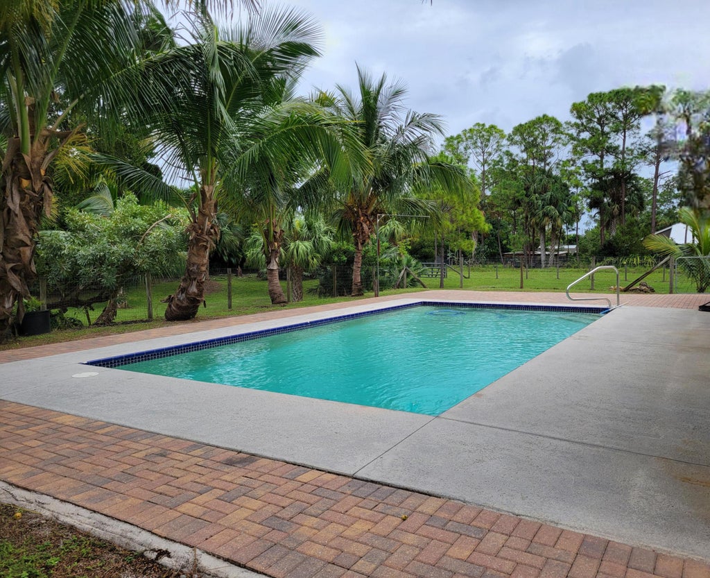 Photo of 16261 93rd Road N, Loxahatchee, FL 33470 (MLS # R11017693)