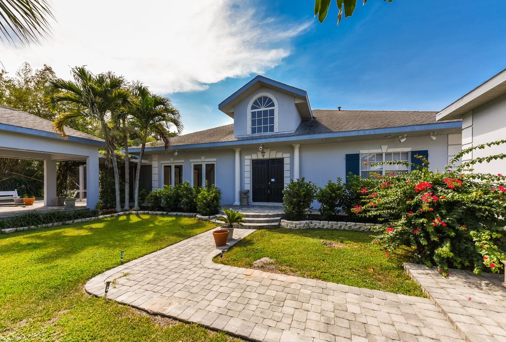 Photo of 11900 SE Plutus Avenue, Hobe Sound, FL 33455 (MLS # R11009508)