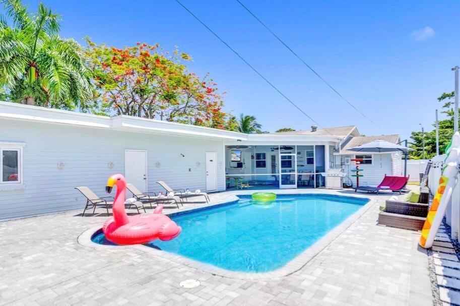 Beautiful renovated beach home in the heart of Dania Beach! This home features 3 bedrooms/2.5 bathrooms, a private pool with an outdoor bathroom and shower, a screened in patio, and impact windows and doors throughout. The master bedroom has 2 large walk in closets and an enormous master bathroom. Minutes from the beach and restaurants and close to major highways. This home is perfect for a family and entertainment!