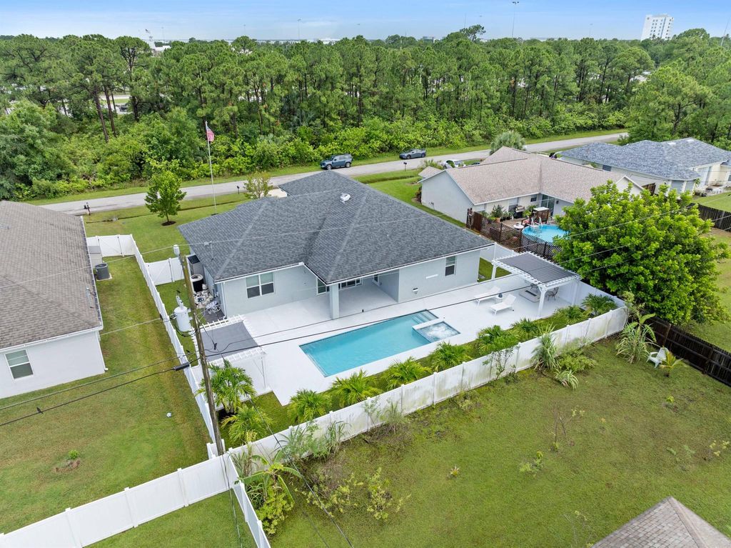 Photo of 2265 SW Kenwick Avenue, Port Saint Lucie, FL 34953 (MLS # R11117697)