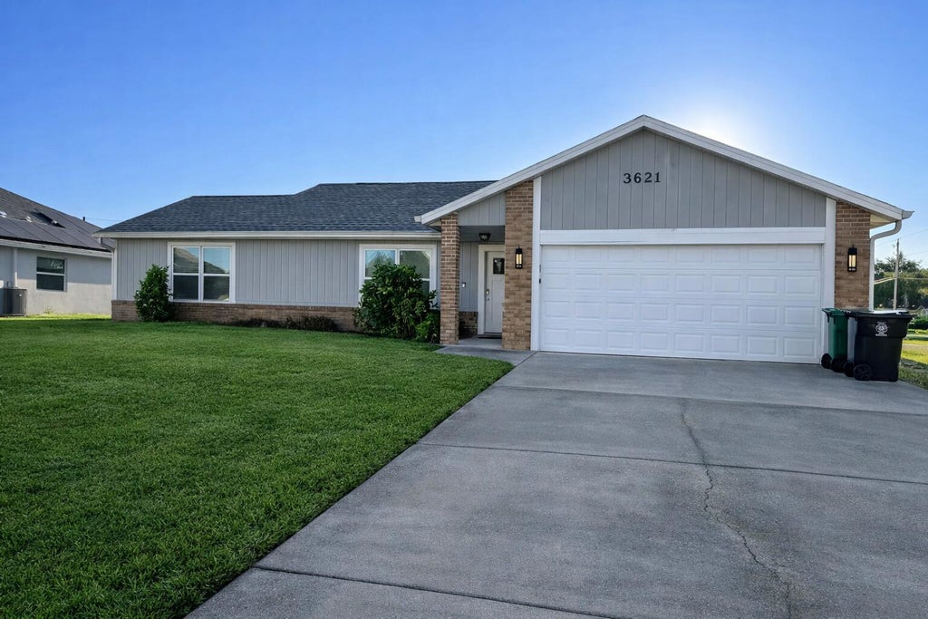 Photo of 3621 SW Rosser Boulevard, Port Saint Lucie, FL 34953 (MLS # B26044070)