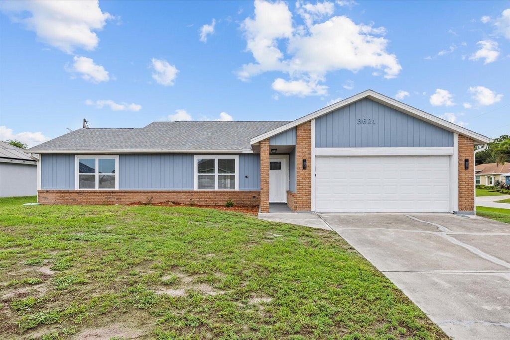 Photo of 3621 SW Rosser Boulevard, Port Saint Lucie, FL 34953 (MLS # B26044070)