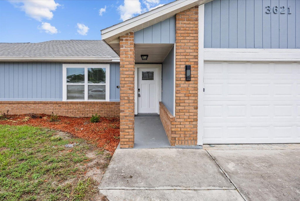Photo of 3621 SW Rosser Boulevard, Port Saint Lucie, FL 34953 (MLS # B26044070)