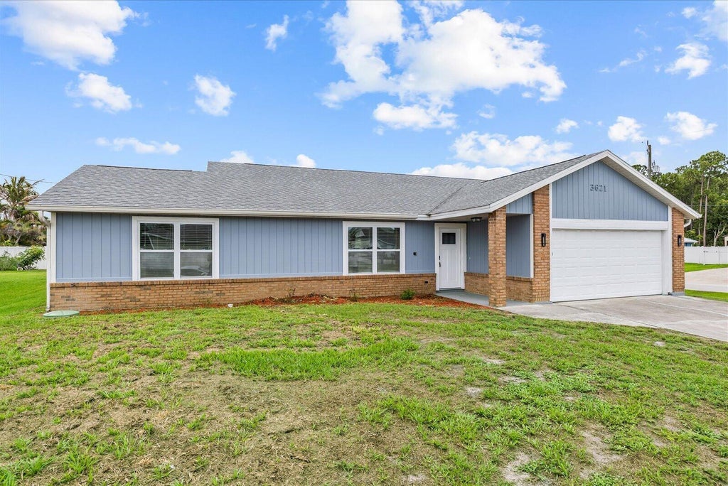 Photo of 3621 SW Rosser Boulevard, Port Saint Lucie, FL 34953 (MLS # B26044070)