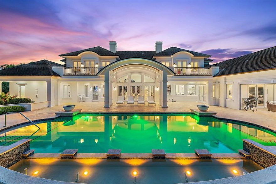 Located in the exclusive Jupiter Hills Club, an invitation-only and top-rated golf community in Tequesta, this home is an imposing estate with recently completed, ultra-luxury renovations by Onshore Construction. New updates include landscaping and irrigation, roof and underlayment, wood ceiling detailing, impact windows and doors, entry door, summer kitchen and full interior kitchen remodel.Sitting on an over half acre plot overlooking the third hole of the Par 5 Village Golf Course, this home features five bedrooms, six full bathrooms, two half-bathrooms, home office with wet bar, home gym and an updated gourmet chef's kitchen with Wolf & Sub-Zero appliances and a butler's pantry. The large master suite includes dual baths, walk-in closets and a storage closet with access to the golf