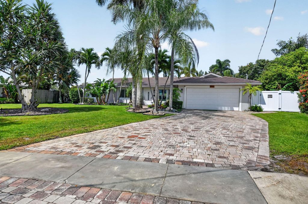 Photo of 6951 NE 7th Avenue, Boca Raton, FL 33487 (MLS # B26035195)