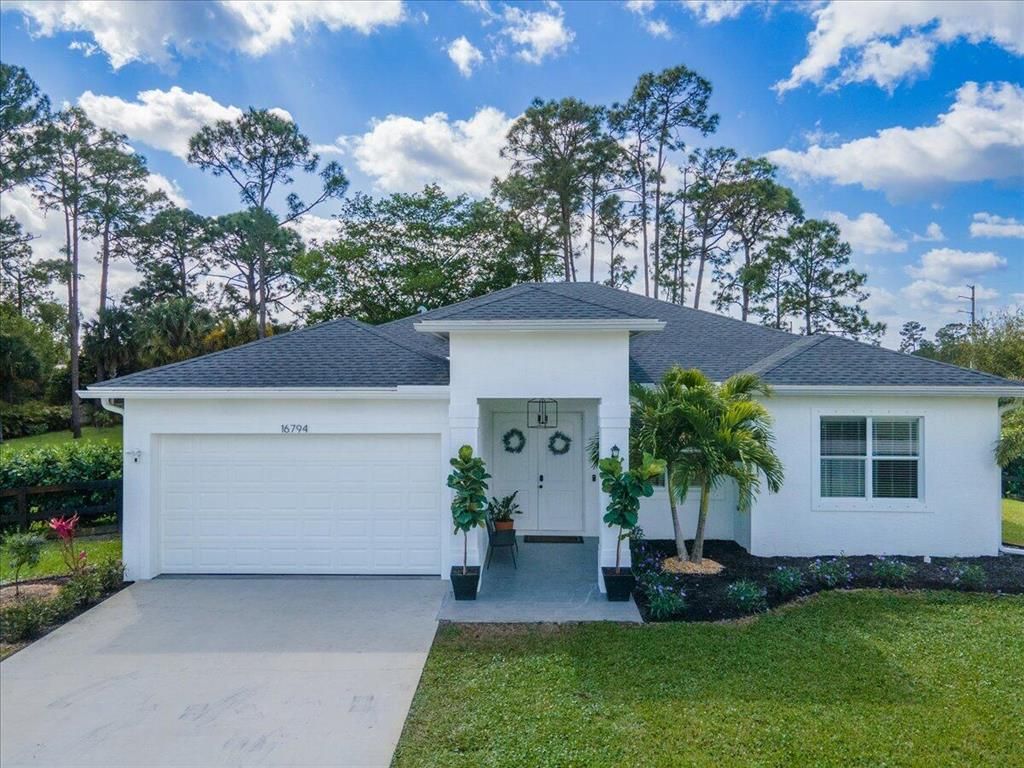 Photo of 16794 E Wiltshire Drive, Loxahatchee, FL 33470 (MLS # R10779166)