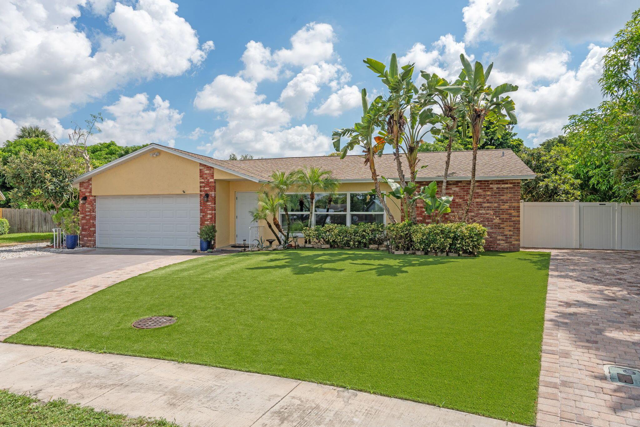 ** OPEN HOUSE SUNDAY 12PM- 2PM - COME SEE THIS BEAUTIFUL MOVE IN READY HOME **Got grapes? Just when you thought grapes only grew in California--think again! You read that right: this stunning home features over 31 fruit plants that produce year-round. (List of plants available upon request.)This gorgeous home has all the bells and whistles on your checklist. Everything is practically brand new--no headaches here for a long time. From the IMPACT WINDOWS & DOORS, to the remodeled BATHROOMS and KITCHEN , NEW FLOORING, TURF, PAVERS, TANKLESS WATER HEATER, TESLA CHARGER, HONDA GENERATOR... the list goes on, but hey, they only give us 800 characters!