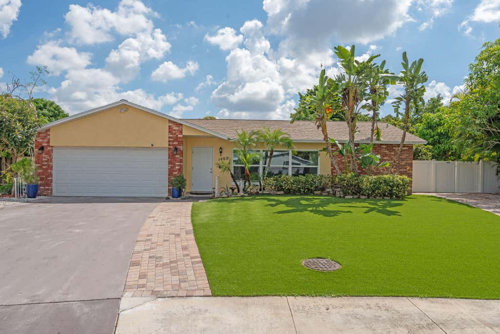 Photo of 1460 Woodcrest Road E, West Palm Beach, FL 33417 (MLS # R11118902)